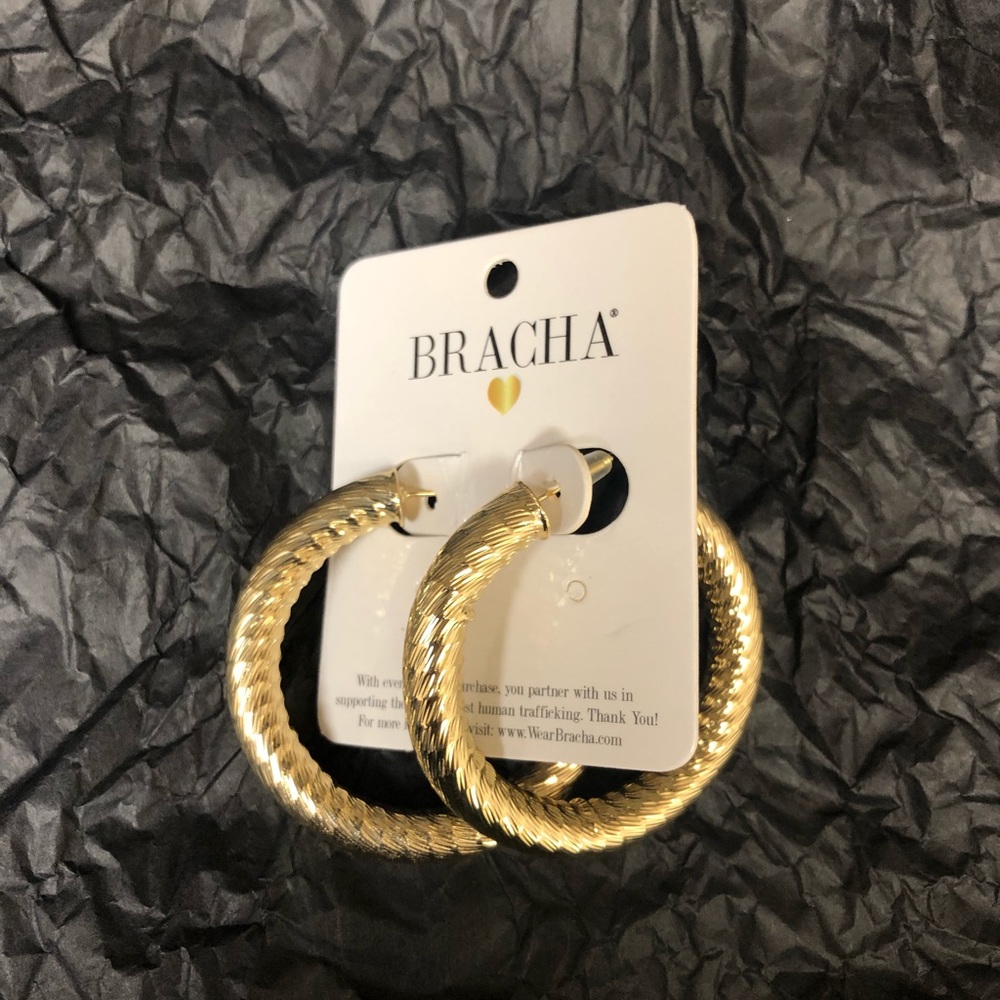 Never worn! gold filled hoops  
14k gold filled 
48mm wide